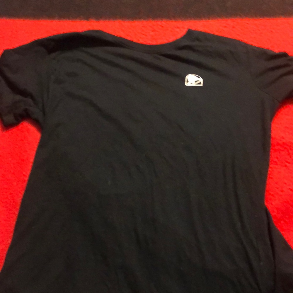 Taco Bell shirt black with white logo and colorful lettering on back
